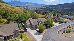 Drone / aerial view featuring a mountain view