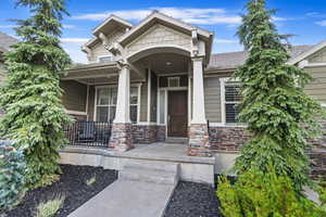 Entrance to property with a porch