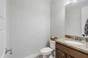 Bathroom with vanity and toilet