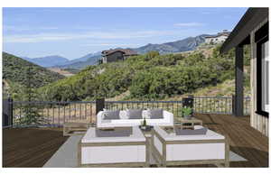 Deck featuring an outdoor living space and a mountain view