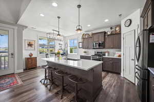 Quartz countertops, with stainless steel energy star appliances. Refrigerator is counter depth.