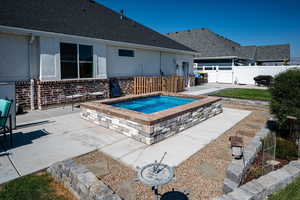 View of 9'X13" in ground hot tub.