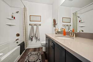 Full bathroom featuring vanity and extra large soaker tub.