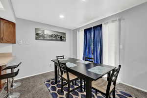 Dining space with carpet floors