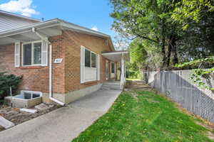 View of home's exterior featuring a yard