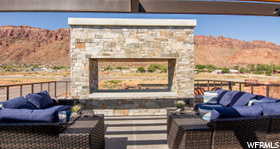 View of patio with an outdoor hangout area and a mountain view