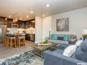 Living room with light wood-type flooring