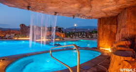 View of pool with a jacuzzi