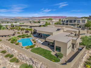 Birds eye view of property with a mountain view