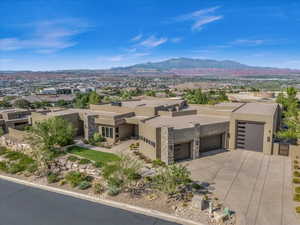 Exterior space with a mountain view and a garage