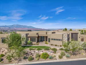 Adobe home featuring a mountain view