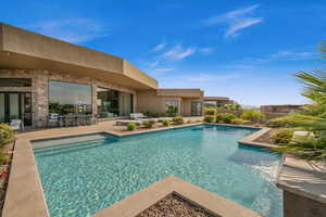 View of swimming pool with a patio