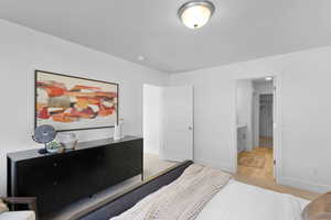 Bedroom featuring light wood-type flooring