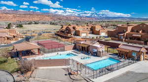 View of pool with a gazebo, a mountain view, and a patio