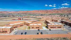 Birds eye view of property with a mountain view