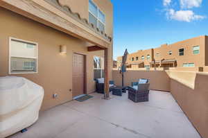 View of patio with outdoor lounge area