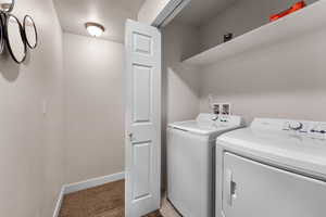 Laundry area featuring washer and clothes dryer