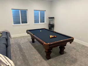 Playroom featuring billiards and dark carpet