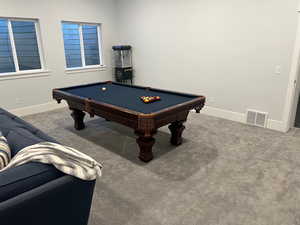 Rec room featuring pool table and carpet flooring