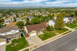 Birds eye view of property with a mountain view