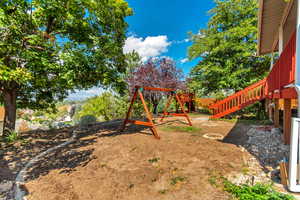 View of yard with a playground