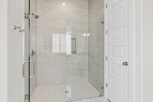 Bathroom featuring a shower stall