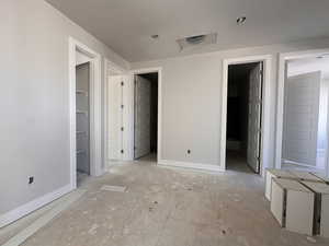 Unfurnished bedroom featuring a spacious closet