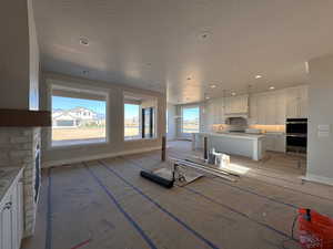 Interior space featuring sink and a wealth of natural light