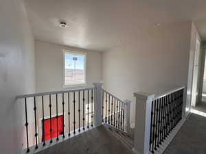 Corridor with carpet floors