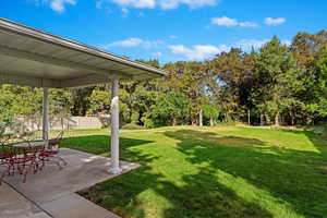 View of yard with a patio area