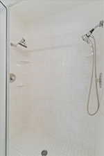 Bathroom featuring tiled shower