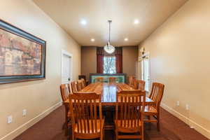 Dining space featuring carpet