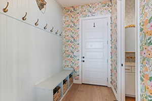 Mudroom featuring light hardwood / wood-style flooring