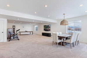 View of carpeted dining space