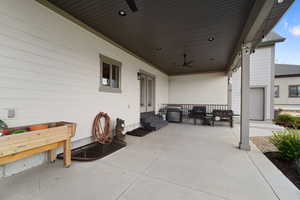 View of patio with ceiling fan