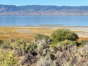 Property view of water with a mountain view