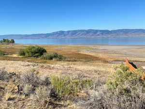 Mountain view featuring a water view