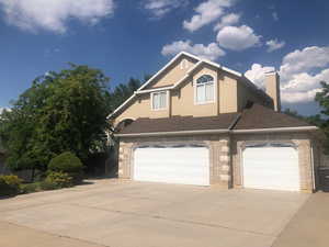 View of front facade with a garage