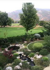 View of yard with a mountain view