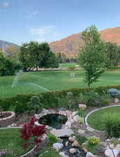 View of yard with a mountain view