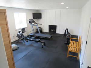 Exercise area featuring a textured ceiling