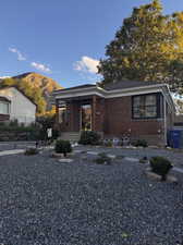 View of front of home featuring a mountain view