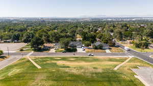 Birds eye view of property with a mountain view