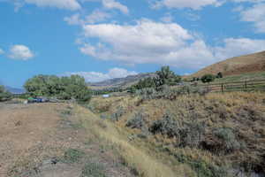 View of mountain feature with a rural view