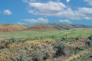 Property view of mountains featuring a rural view