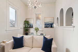 Living room featuring a chandelier