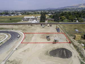 Birds eye view of property with a mountain view