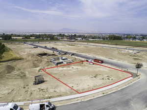 Birds eye view of property with a mountain view