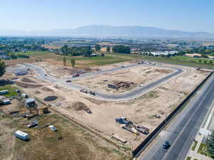 Birds eye view of property with a mountain view