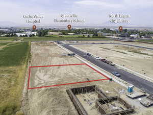 Birds eye view of property with a mountain view